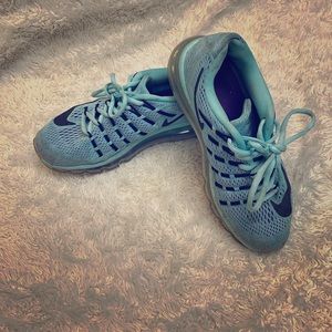 Blue and purple Nike running shoes